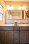 En suite bathroom with double sink vanity and