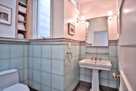 Hall bath with glass tiles and heated floor