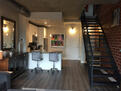 Hardwood floors, exposed brick, metal stairca