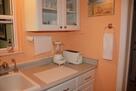 Kitchen with blender and toaster.