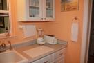 Kitchen with blender and toaster.