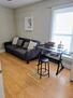 Upstairs office room with futon and desk