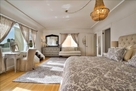 view of queen bedroom full view