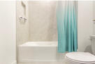 Guest bathroom with tub