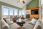 Living room with views and curated furniture.