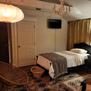 Twin beds, blackout curtains, and tv.