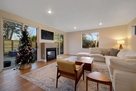 Family room with indoor/outdoor fireplace and