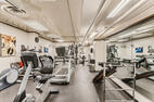 Weight lifting room with TV to keep you enter