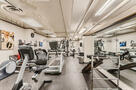 Weight lifting room with TV to keep you enter