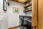 laundry with granite folding counter