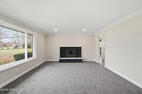 Spacious Living Room with Fireplace