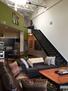 Two story Living Room with skylight
