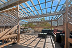 Private rooftop deck seating and pergola