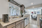 Kitchen East with window to Sunroom