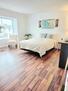 Spacious master bedroom with closet