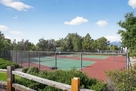 tennis courts, club house and pool on propert