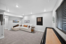 Basement includes TV, shuffleboard, dartboard