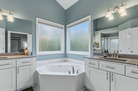 Big tub with his and hers sink