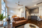 Gather in the modern living area on the first