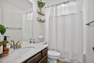 A serene guest bathroom, offering a touch of 