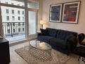 Well lit Living Room with Balcony