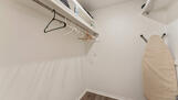 Walk in closet off master bath.
