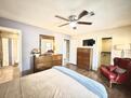 Primary bed and closet to living space