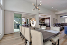 Dining open to kitchen, living room, and outs