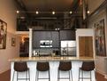Custom kitchen with granite countertops and S