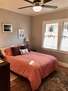 1st floor bedroom, ceiling fan and three wind