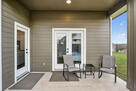 Covered Backyard Porch Seating Area