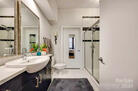 Spacious bathroom with washer/dryer