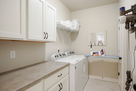 In-unit laundry with pull down ironing board 