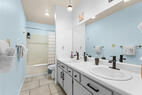Primary suit bathroom with double vanities