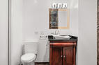 Bathroom vanity beside the jetted tub