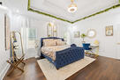 Relax like royalty in the king-size bed in th