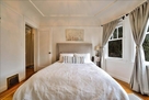 view of queen bed in bedroom 2
