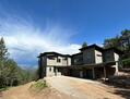 Whole house exterior, asphalt driveway has si