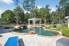 Resort-style lazy river pool with hot tub