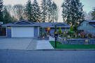 Welcome home to a beautifully landscaped