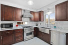 Nice kitchen with natural stone countertops