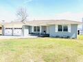 Front of home with plenty of parking for free