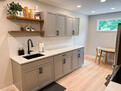 Brand new kitchen with LVP flooring, white qu