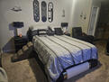 Master Bedroom has 2 dressers, a 55" TV for y