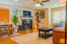 Living room with TV and fireplace
