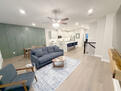 expansive living/dining next to primary suite