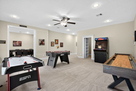 Game room with foosball table, arcade and mor
