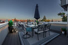 Unwind under the stars on this spacious rooft