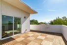 Rooftop wooden deck. View of Dickies Area