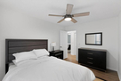 Queen bed in bedroom 1.